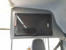 hire mahindra tourister van with TV facility